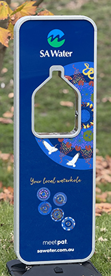 A blue, portable drinking fountain, from the front on.